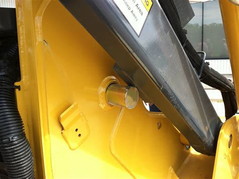 john deere 325 skid steer pedal lock|skidsteer jd 250 boom lock.